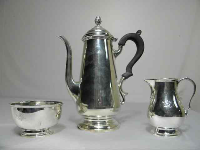 Appraisal: Sterling silver three piece assembled tea set Includes Tiffany sterling