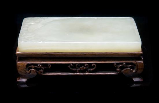 Appraisal: Yellow Jade Inkstone of rectangular form the top having impressed