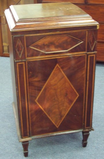 Appraisal: A mahogany gramophone cabinet converted into a chest of three