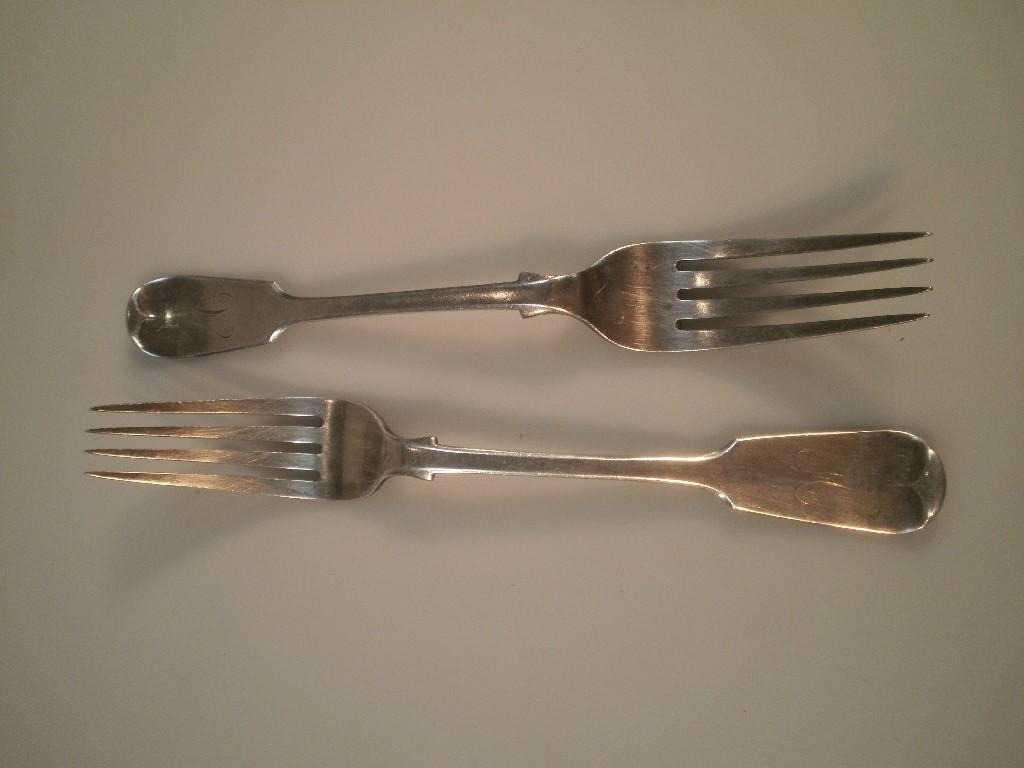 Appraisal: Two Victorian fiddle pattern table forks London with engraved initial