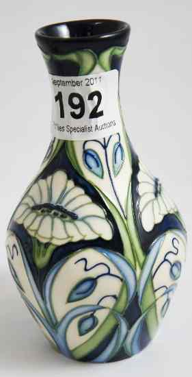 Appraisal: Moorcroft Vase Decorated with White Blue and Green Flowers by