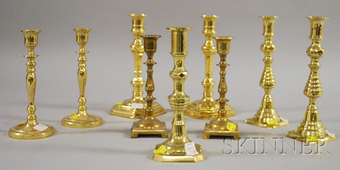 Appraisal: Nine Brass Candlesticks including four pairs ht to in