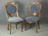 Appraisal: CHAIRS - PAIR OF FANCY VICTORIAN WALNUT UPHOLSTERED SIDE CHAIRS