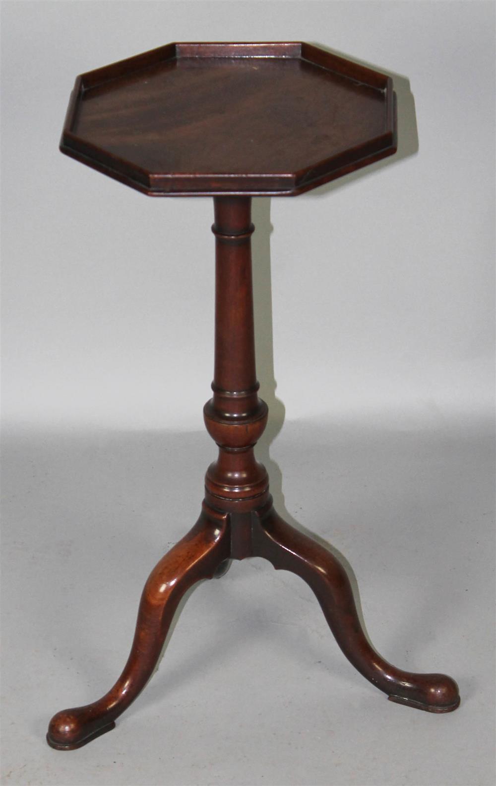 Appraisal: GEORGE II CARVED MAHOGANY CANDLESTAND the octagonal galleried top on