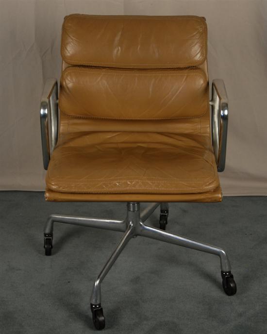 Appraisal: A Herman Miller Desk Chair aluminum and plywood frame yellow