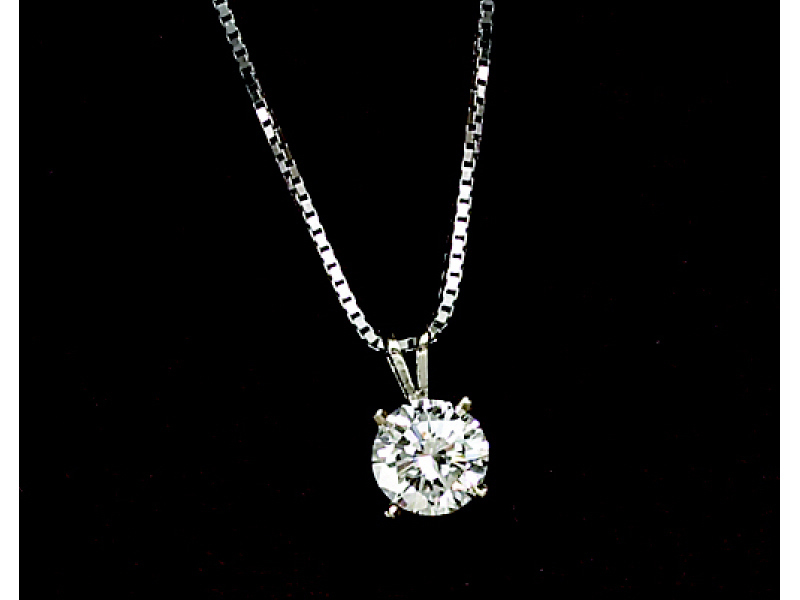 Appraisal: DIAMOND PENDANT White gold pendant set with one round brilliant