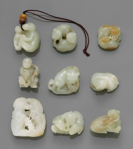 Appraisal: A group of nine carved nephrite toggles Late Qing Dynasty