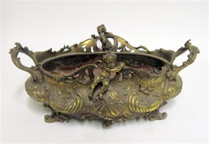 Appraisal: Continental gilt metal jardiniereWith c-scroll cast handles to The sides