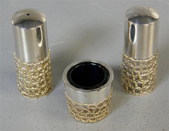 Appraisal: Stuart Devlin silver three piece cut card pattern cruet set