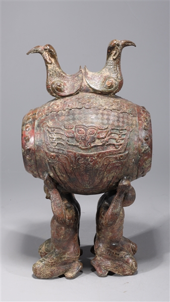 Appraisal: Chinese archaistic bronze statue of two men holding a drum