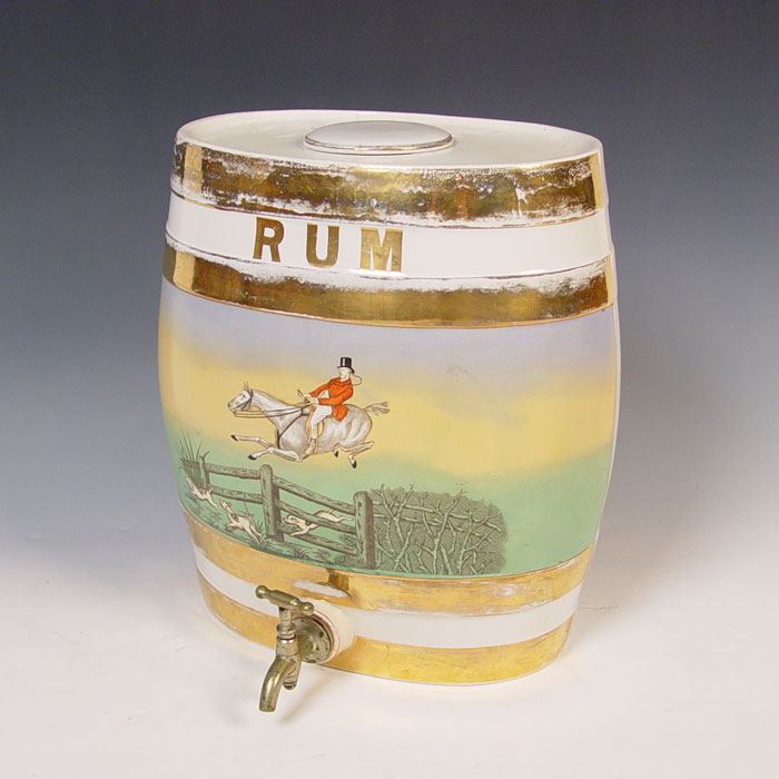 Appraisal: STONEWARE RUM CASKET WITH SPIGOT Painted hunt scene with gold