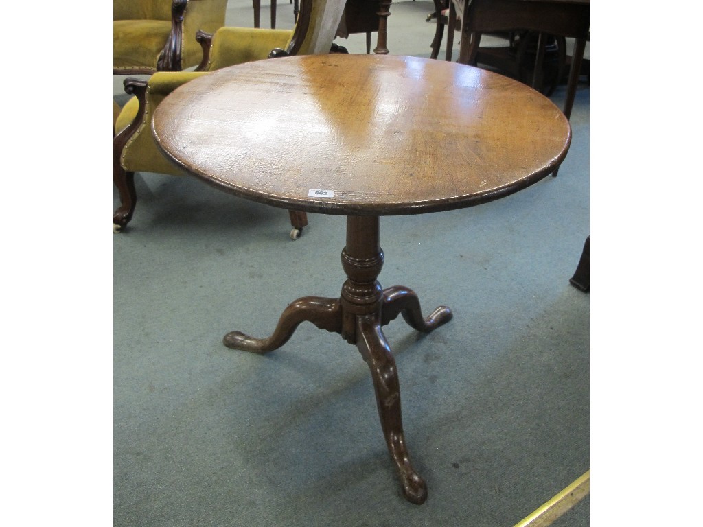 Appraisal: A th century mahogany snap top tripod table cm high