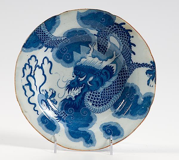 Appraisal: JAPANESE BOWL WITH DRAGON A shallow Japanese blue and white