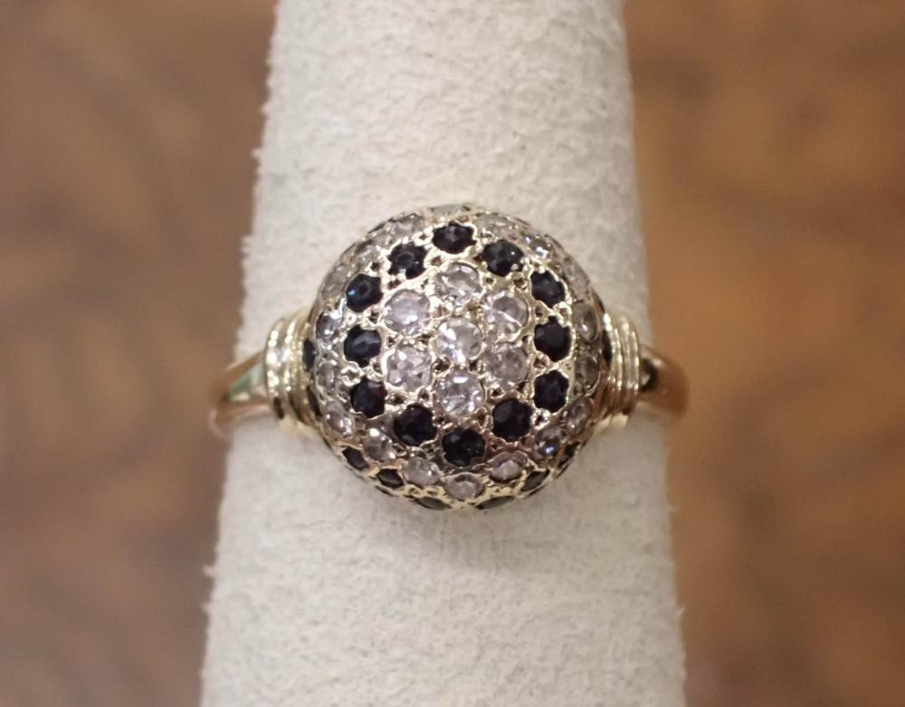 Appraisal: DIAMOND SAPPHIRE AND FOURTEEN KARAT GOLD RING The yellow gold