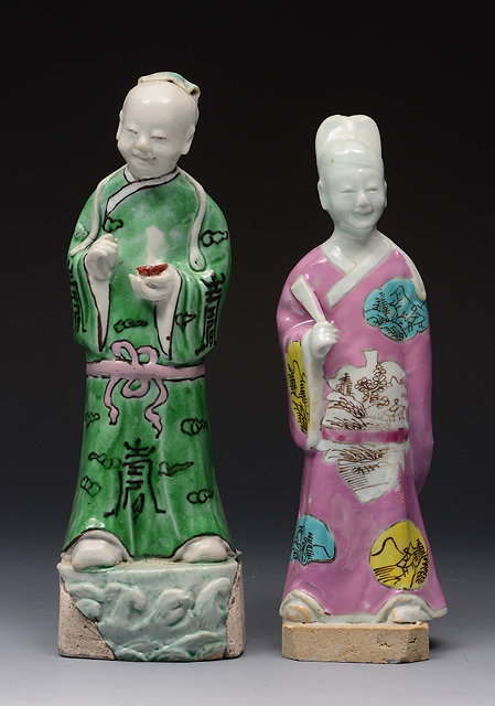 Appraisal: A PAIR OF CHINESE FAMILLE ROSE FIGURES of Immortals with