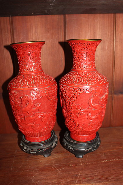 Appraisal: A PAIR OF CHINESE RED LACQUER VASES of ovoid form