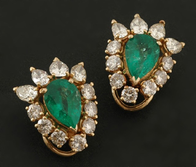 Appraisal: A pair of emerald and diamond earrings Each earring set