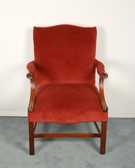 Appraisal: A Georgian-style Library Chair with a shaped crest to the