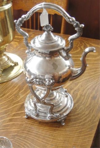 Appraisal: SILVER PLATE TEA POT ON STAND