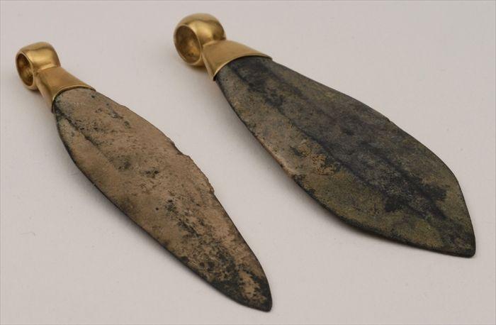 Appraisal: TWO BRONZE LEAF-SHAPED SPEARHEADS MOUNTED AS PENDANTS in Provenance Property