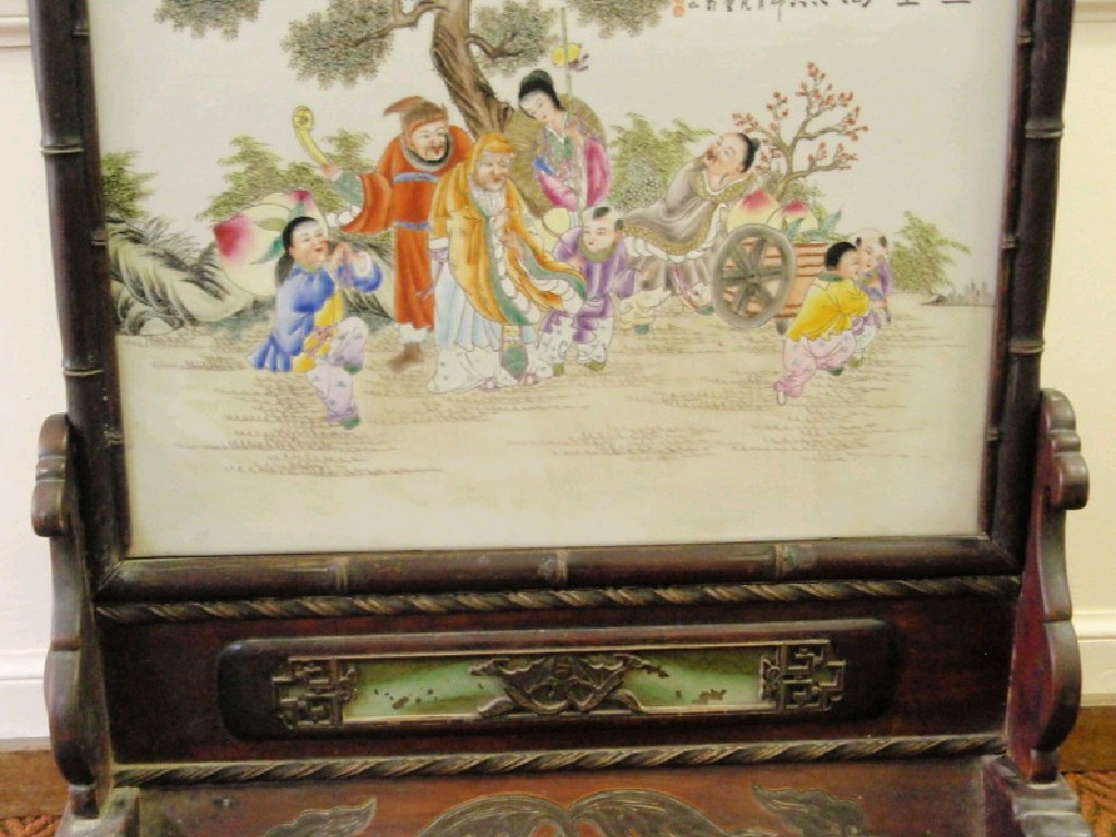 Appraisal: A Chinese porcelain plaque and panel set in a hardwood