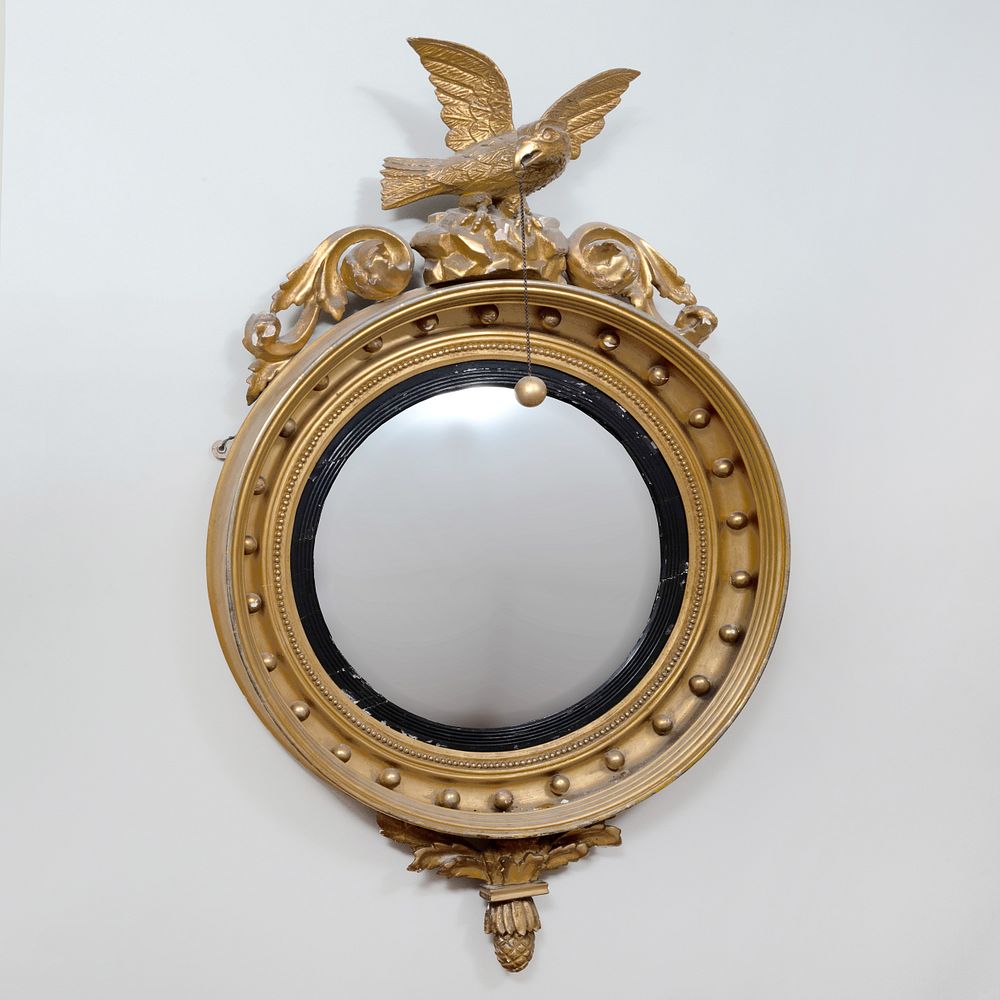 Appraisal: Regency Giltwood and Ebonized Convex Mirror x in Dimension Condition