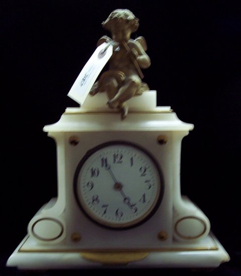 Appraisal: An onyx mantel clock with cherub surmount cm