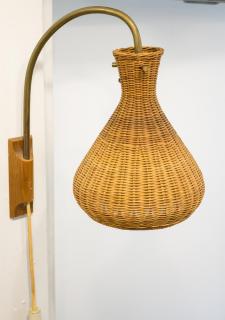 Appraisal: Danish Mid-Century Modern woven rattan bell-form shade on arching copper