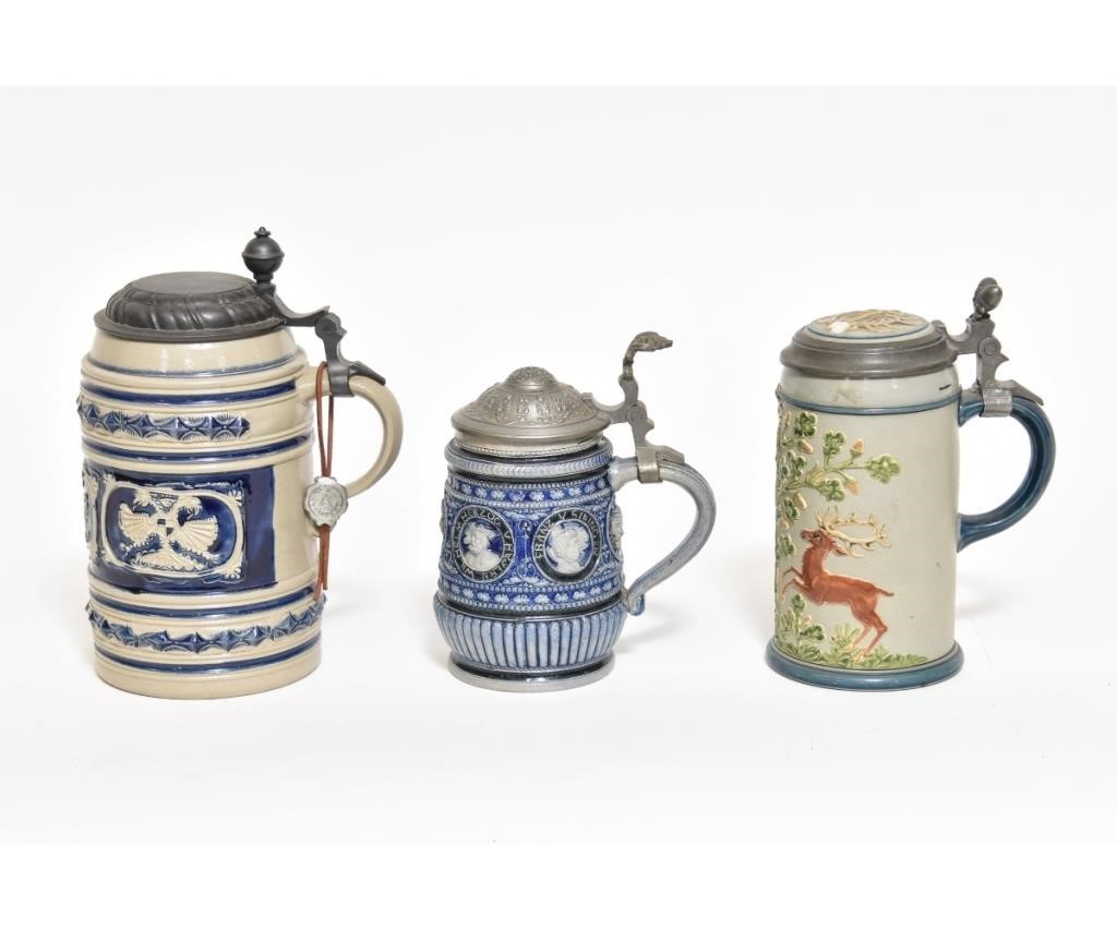 Appraisal: Three German steins one a Westerwald dated with design in