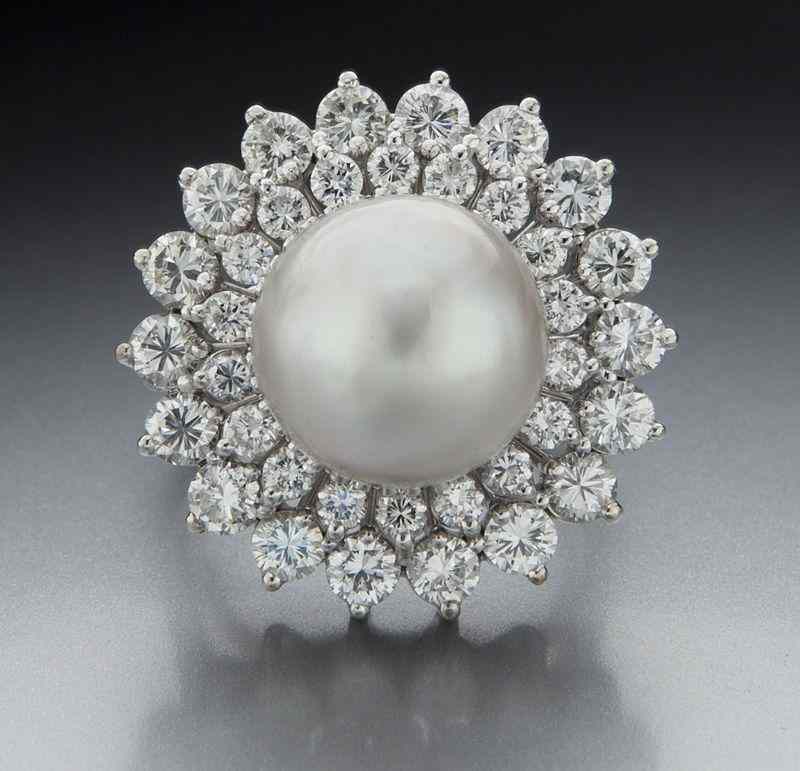 Appraisal: K gold South Sea pearl and diamond dinner ringfeaturing a