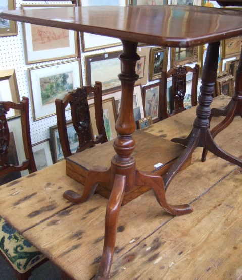 Appraisal: A Regency mahogany rectangular topped snap-top wine table with a