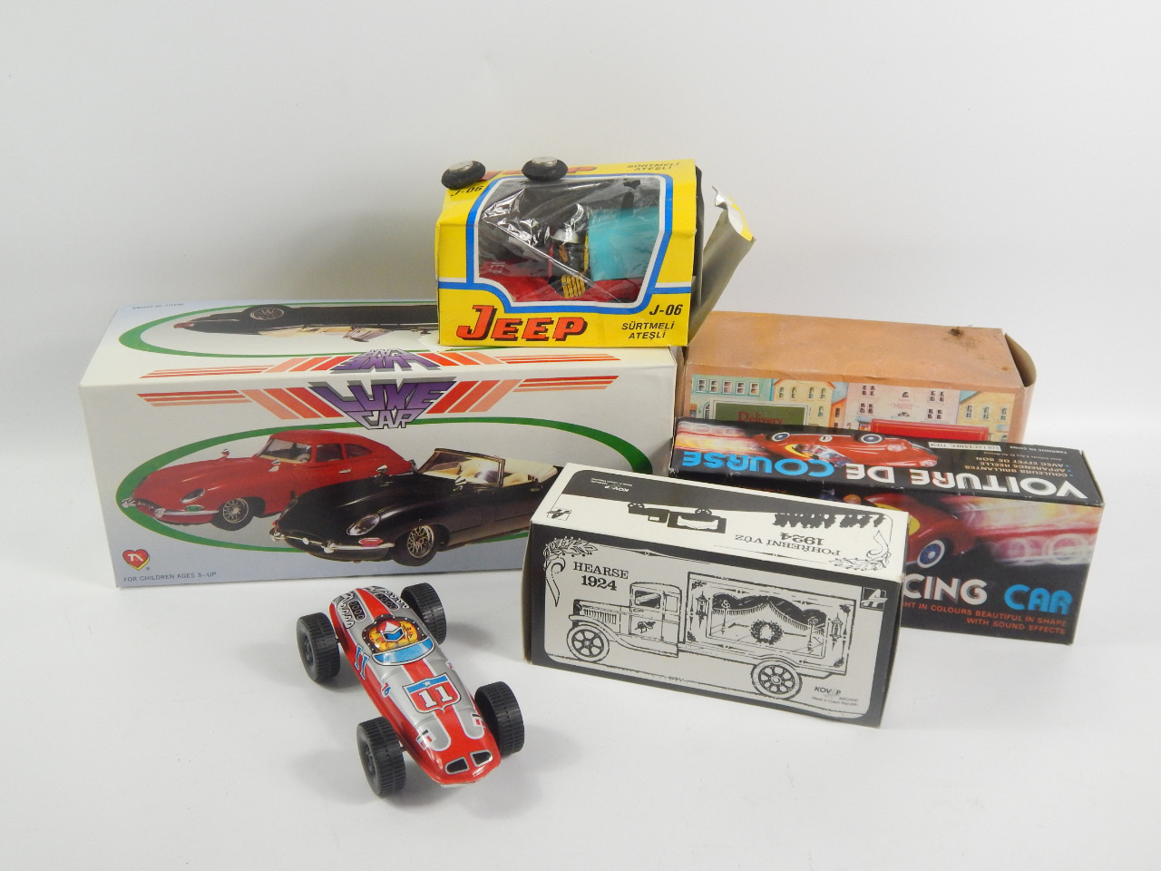 Appraisal: Modern die cast and modern tin plate model vehicles two