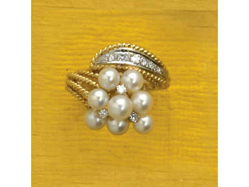 Appraisal: K YELLOW GOLD PEARL AND DIAMOND RING with eight pearls