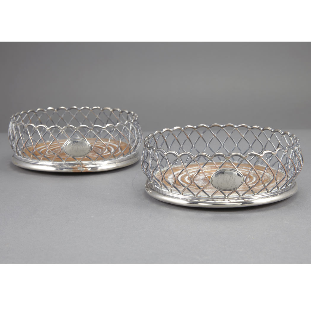 Appraisal: Pair of Sheffield Silver Plated Wirework and Treen Bottle Coasters