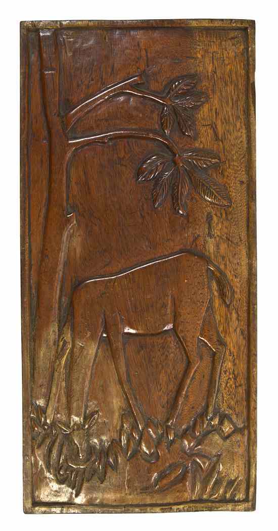 Appraisal: A Carved Wood Relief Plaque depicting a giraffe under a