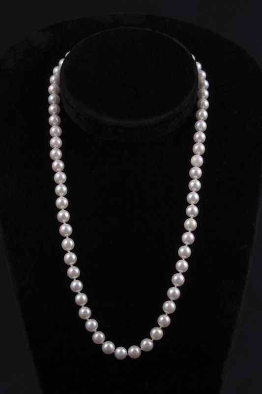 Appraisal: '' STRAND OF MM CULTURED PEARL NECKLACE Double knotted k