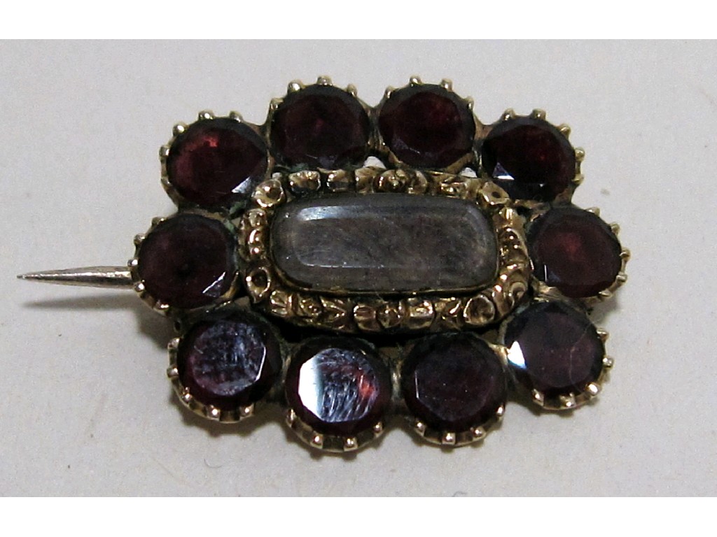 Appraisal: Georgian gold garnet set remembrance brooch with inscription to reverse