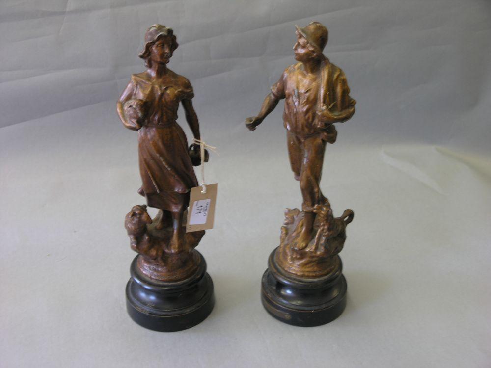 Appraisal: A pair of late th century gilded spelter statuettes shepherd