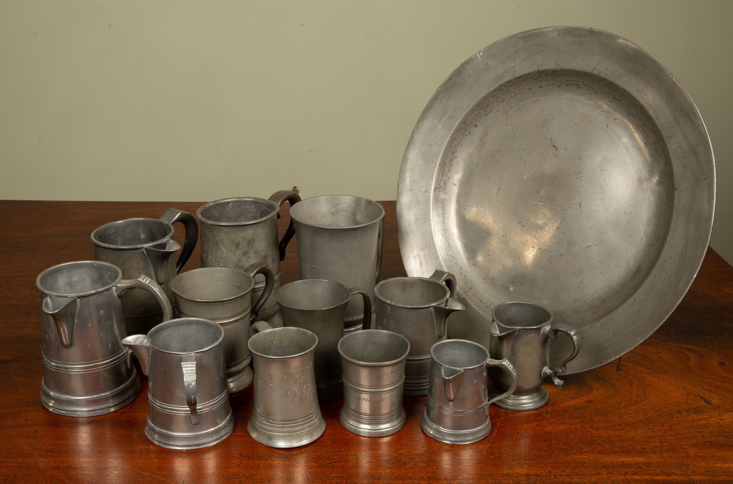 Appraisal: A collection of th century table pewter including a cm