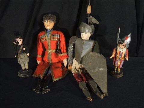 Appraisal: FOUR INTERNATIONAL DOLLS IN MILITARY DRESS