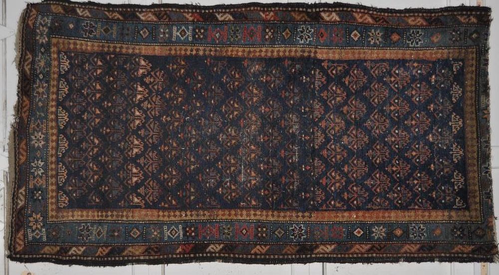 Appraisal: Northwest Persian Rug in brown tones ' by ' Losses