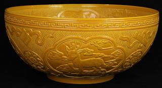 Appraisal: Chinese Large Yellow Bowl Chinese yellow glazed large bowl molded