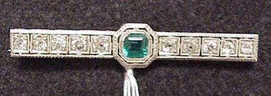 Appraisal: JEWELRY Platinum filigree bar pin set with one square emerald