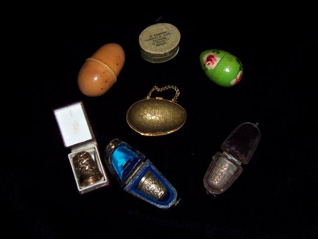 Appraisal: A small collection of cased thimbles mostly silver the cases