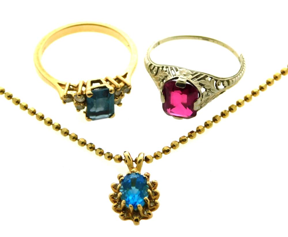 Appraisal: JEWELRY Two colored gemstone rings and one colored gemstone necklace