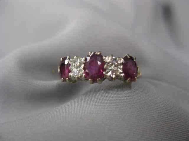 Appraisal: Ruby Diamond Ring oval rubies totaling carats and diamonds totaling