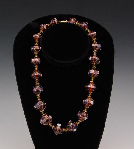 Appraisal: STRAND OF VENETIAN BEAD NECKLACE Amber color with aventurine and