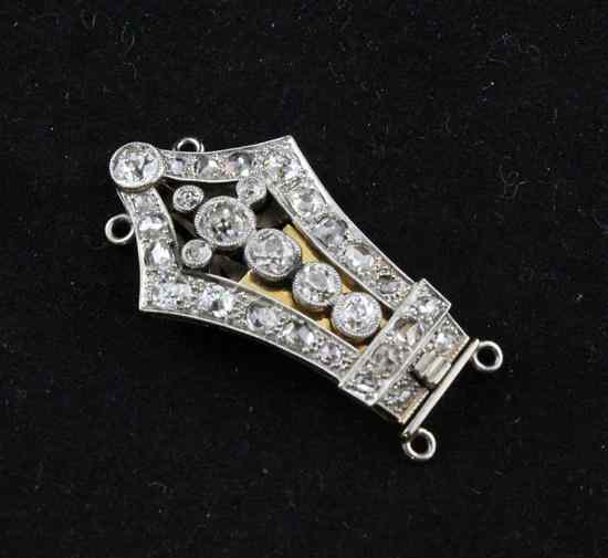 Appraisal: A 's diamond set platinum and yellow gold necklace clasp