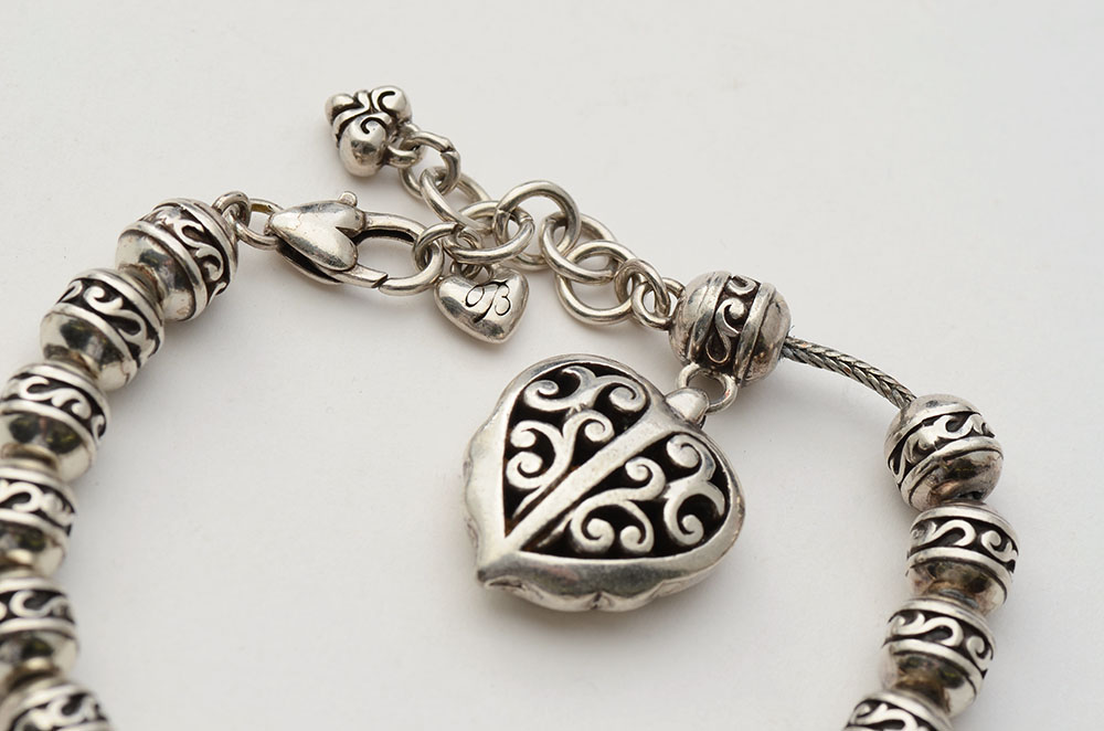 Appraisal: STERLING SILVER DESIGNER BRACELET ''HEARTS R WILD'' '' adjustable bracelet