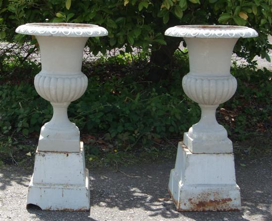 Appraisal: Pair of twentieth century grey painted campana shaped cast-iron garden